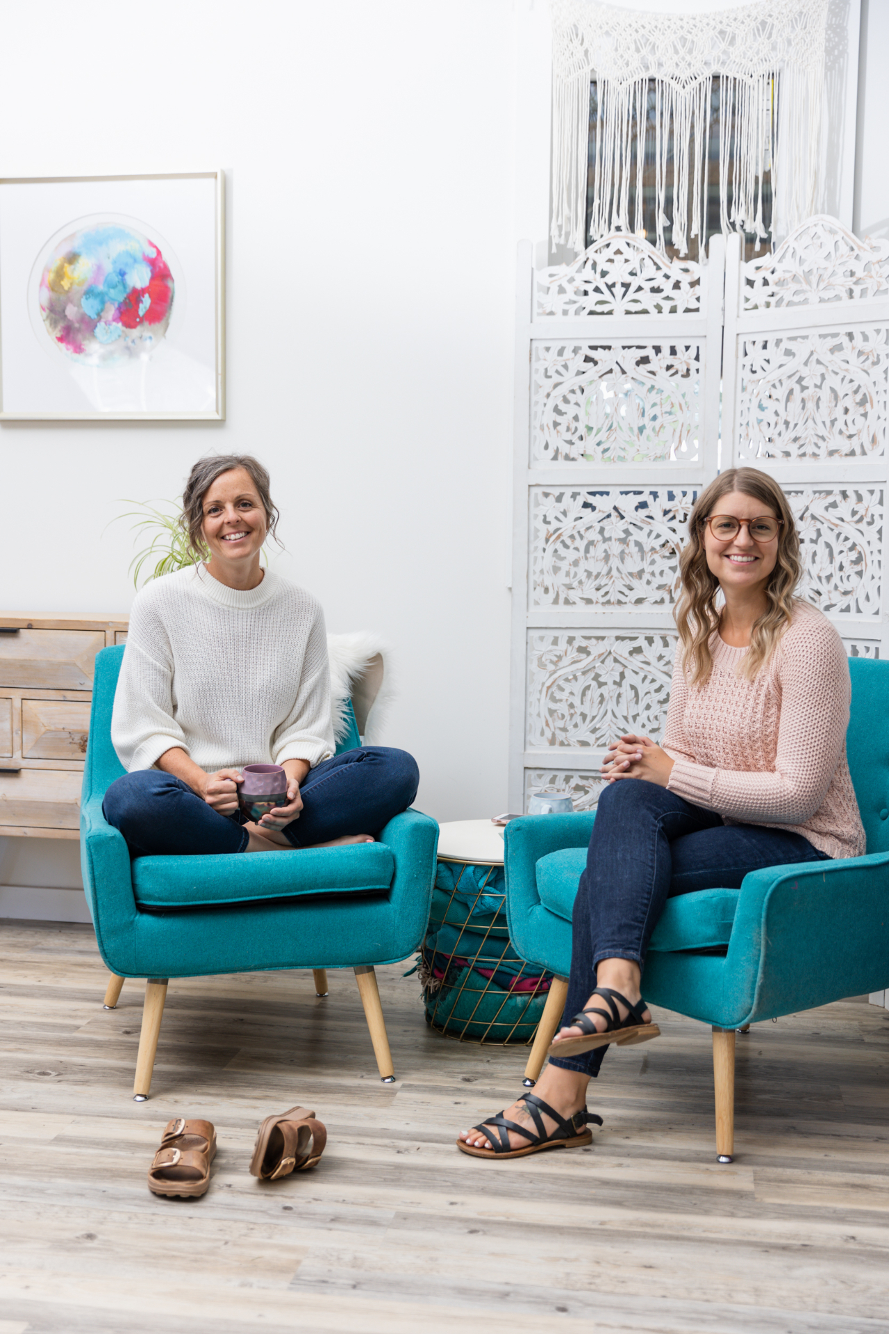 Founder portrait — Megan and Kalyn seated